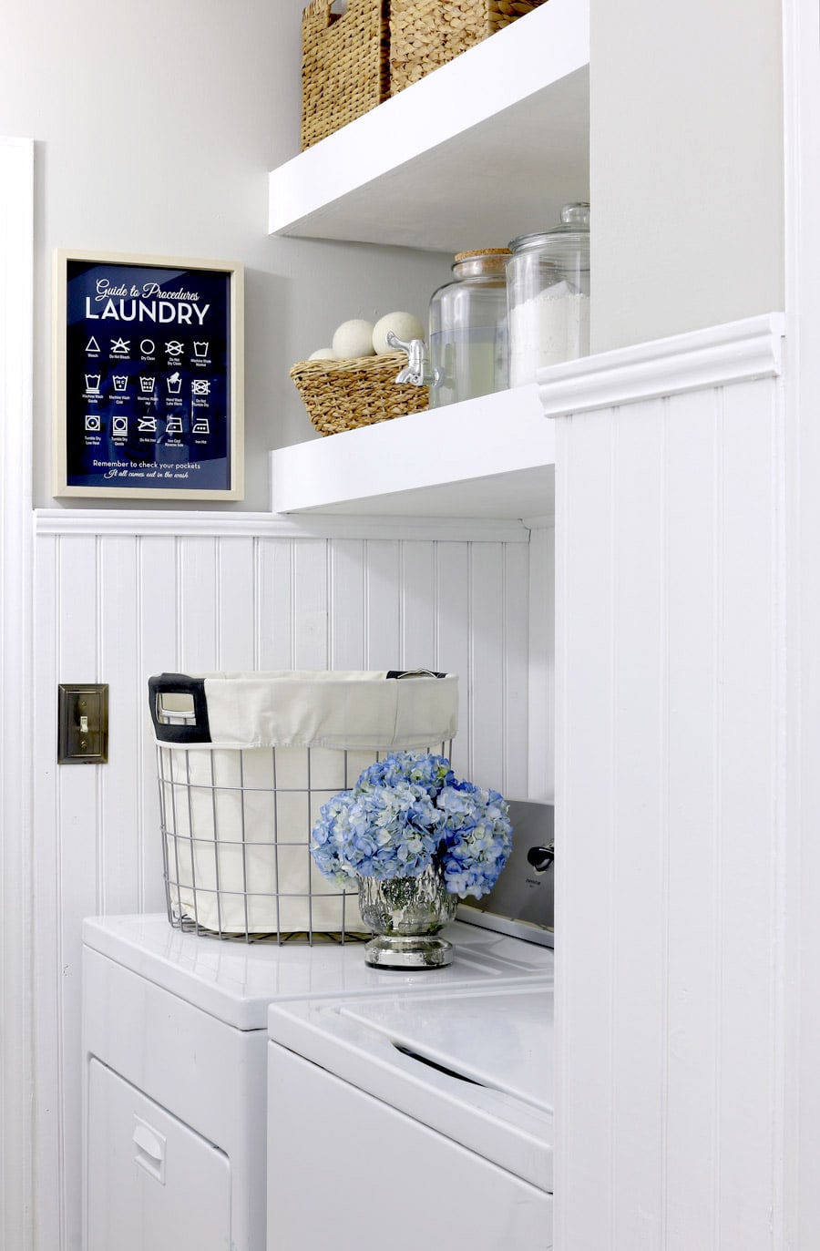 Featured image of post Laundry Room Floating Shelves Between Cabinets - After deciding where i wanted my shelves (i decided to give 13″ between each shelf) i used my level to draw a 4 ft.