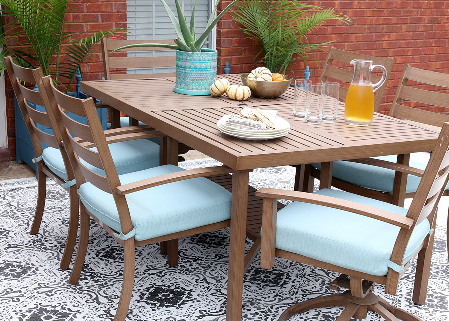 How to use stencils and concrete stain to create a faux rug for your outdoor patio