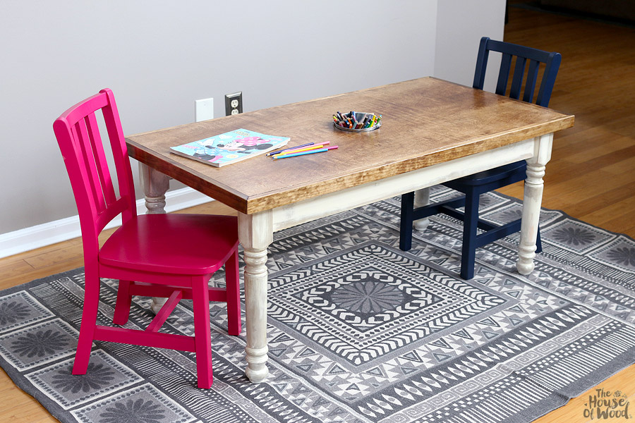 How to build a kids farmhouse table with storage for art supplies and hidden cubbies! Via Jen Woodhouse