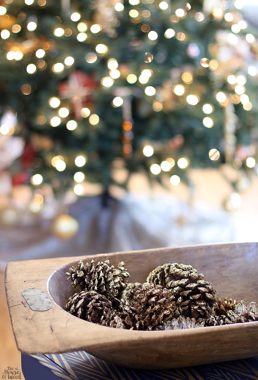 Christmas dough bowl filled with glitter pinecones