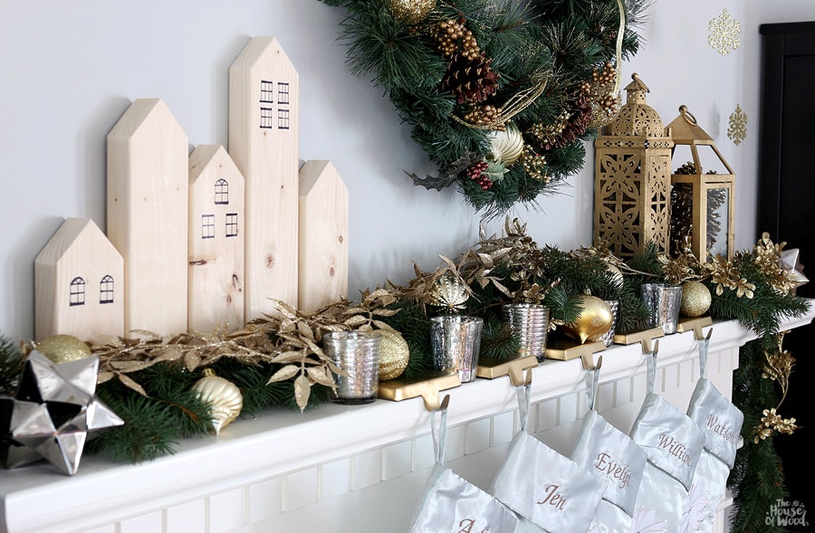 Christmas mantel with scrap wood houses via Jen Woodhouse