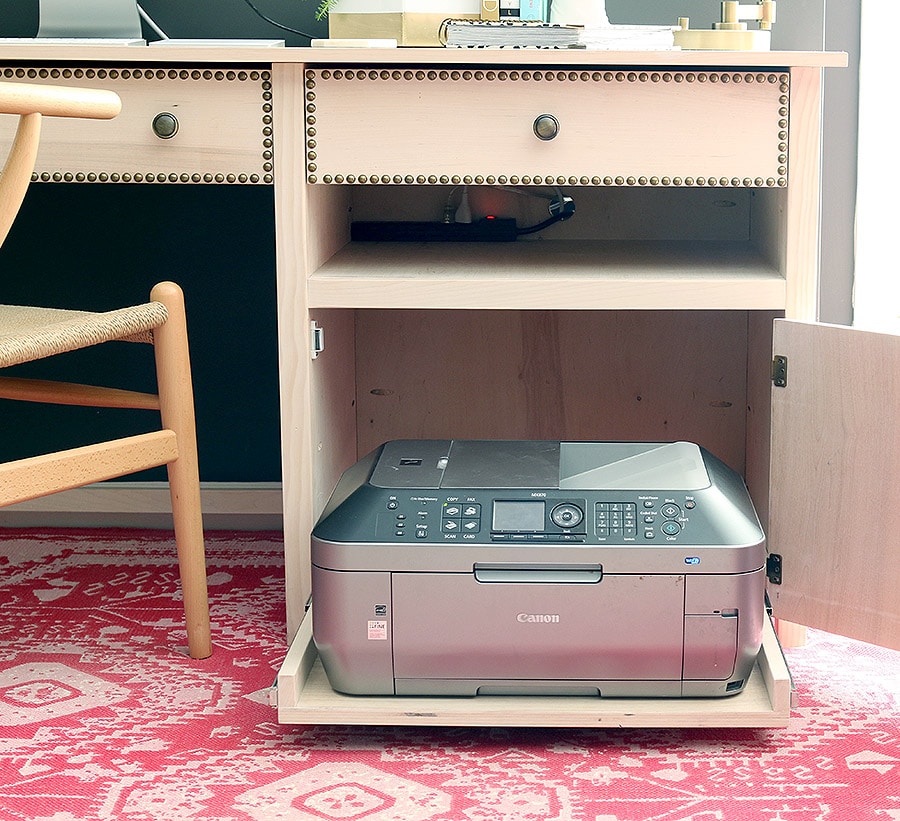 LOVE this! Hide the printer on a slide-out tray