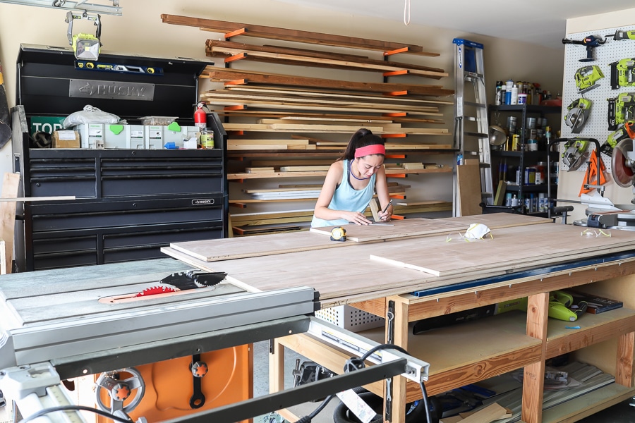 Jen Woodhouse measuring walnut plywood pieces