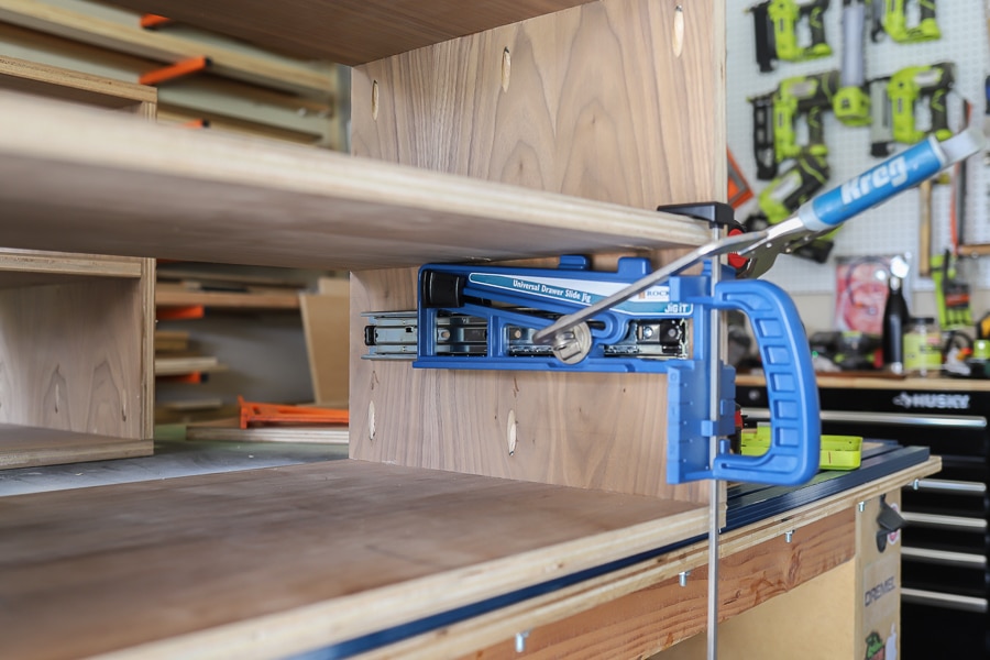 Installing drawer slides is easy with this drawer slide jig from Rockler Woodworking