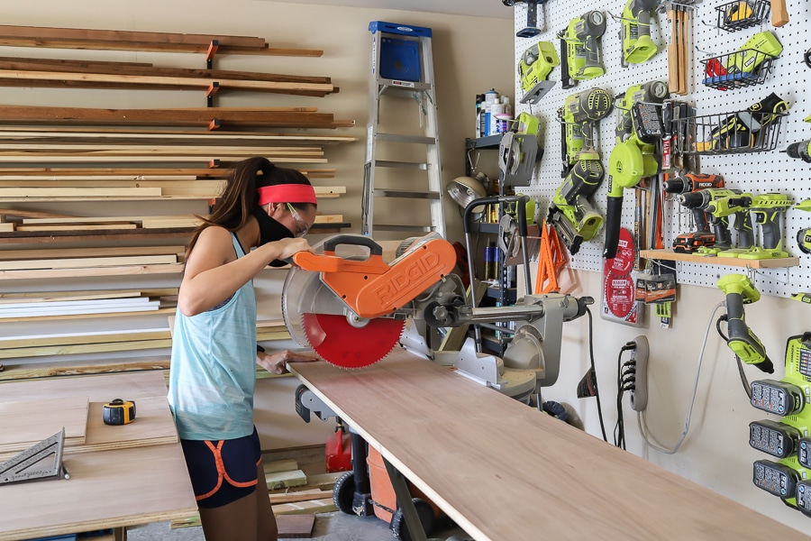 Jen Woodhouse cutting walnut plywood to length
