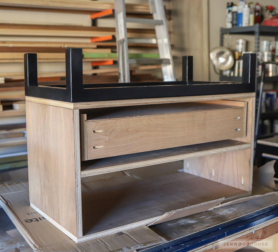 Attaching the steel base to the cabinet