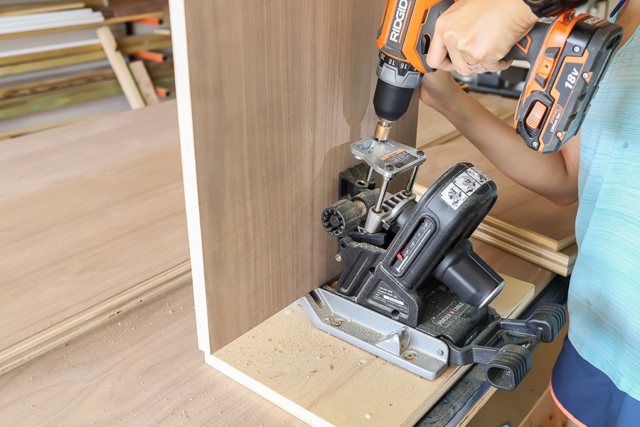 Jen Woodhouse drilling pocket holes with the Porter Cable pocket hole jig