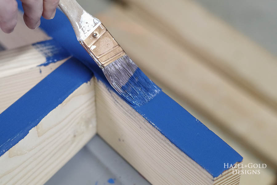 Easy DIY Outdoor Bench - Paint leg sections dark blue