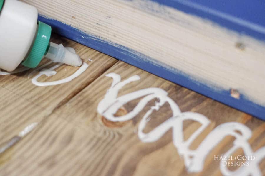 Easy DIY Outdoor Bench - Use wood glue and screws to attach the legs to the top.