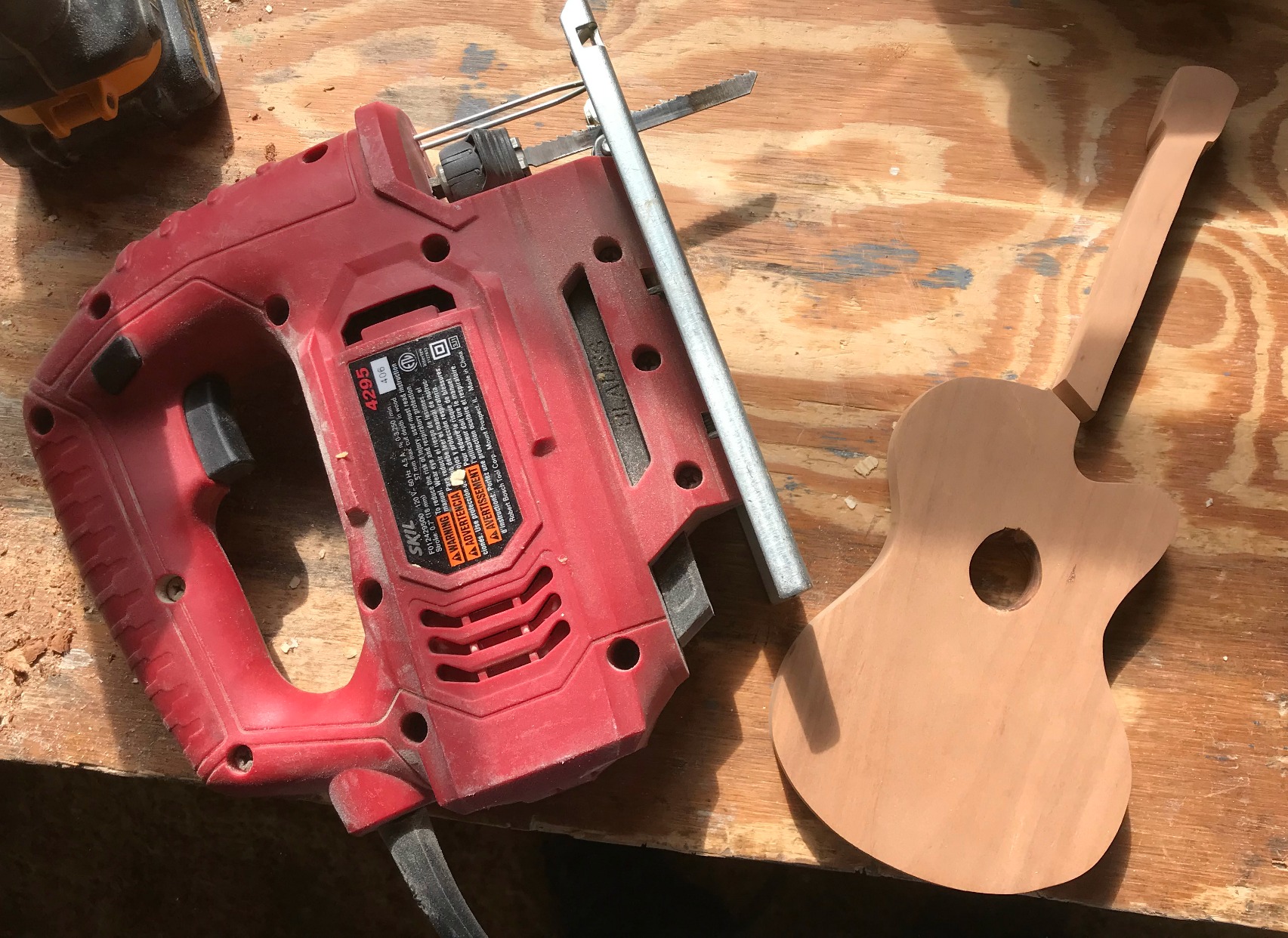 Cut Guitar in half to create two bookend sides