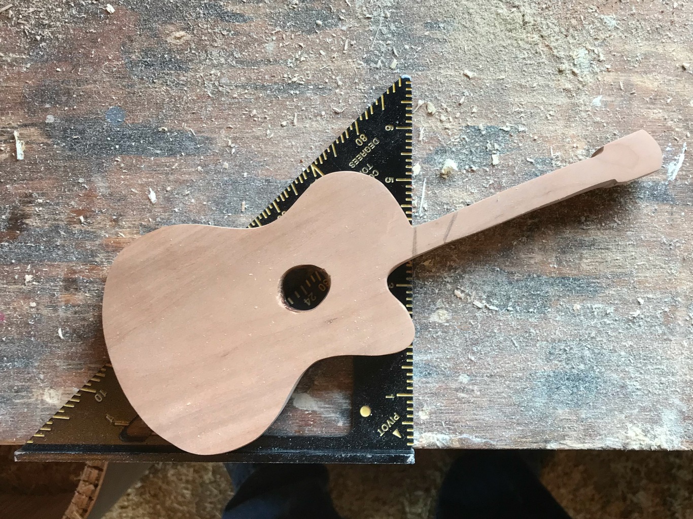 Determine where to cut guitar to create two bookend sides