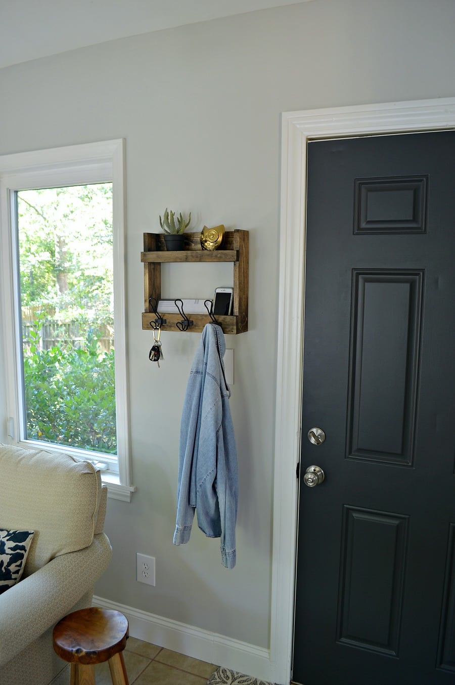 Rustic wall mounted shelves with coat hooks