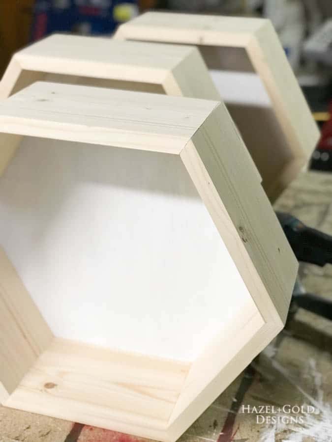 DIY Hexagon Shelf for Craft Storage- shelves are finished, just add a couple layers of polycrylic