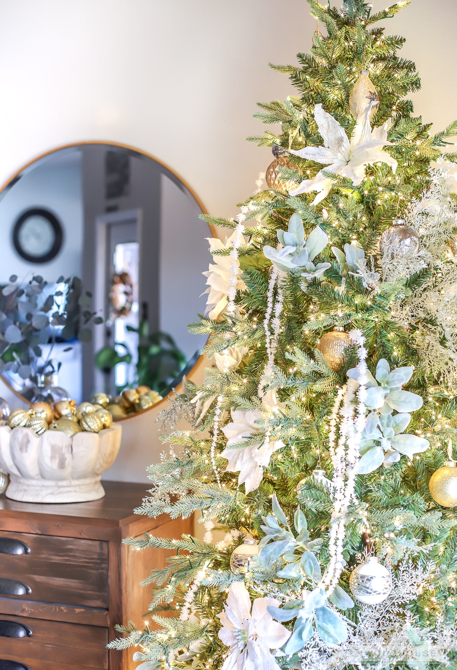 White and gold Christmas tree in the dining room