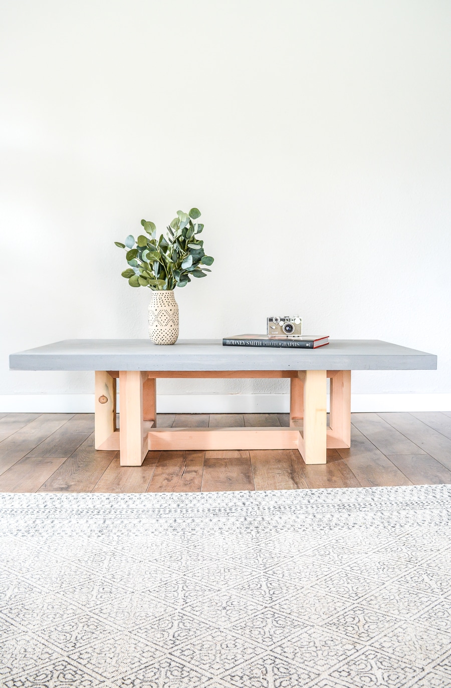 Simple wood coffee table with concrete top