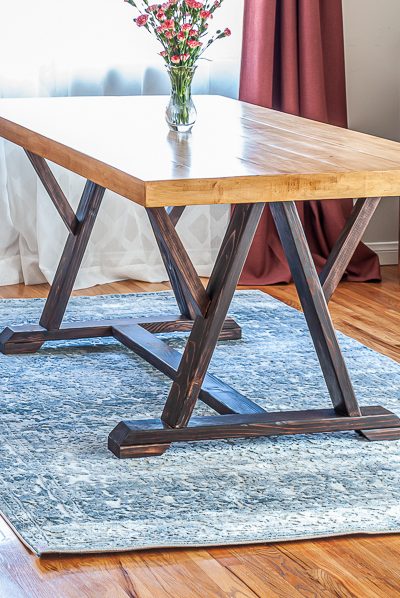 How to build a DIY trestle dining table with angled legs. Free plans by Jen Woodhouse