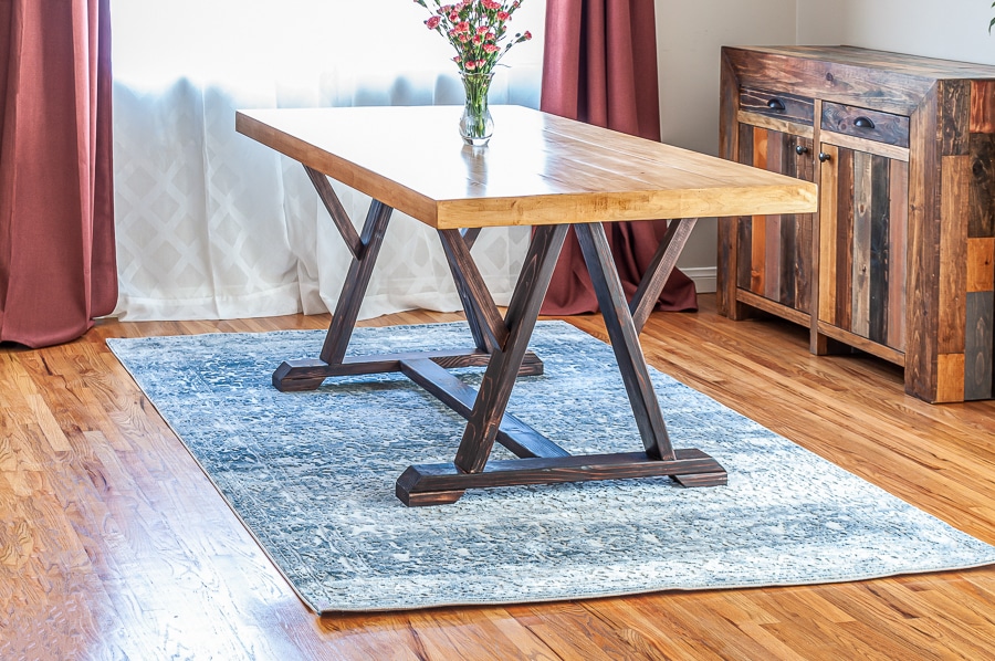 How to build a DIY trestle dining table with angled legs. Free plans by Jen Woodhouse