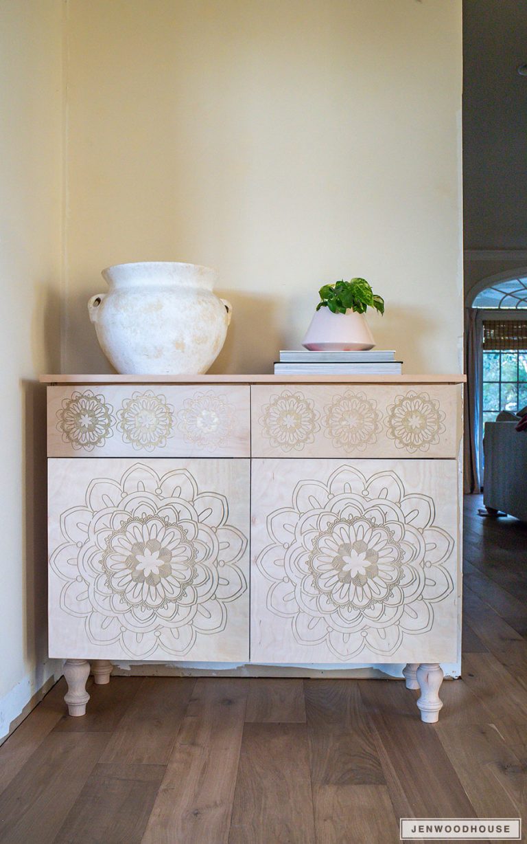 carved entryway cabinet