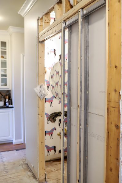 Powder Room Renovation With A Floating Vanity and Statement Wallpaper