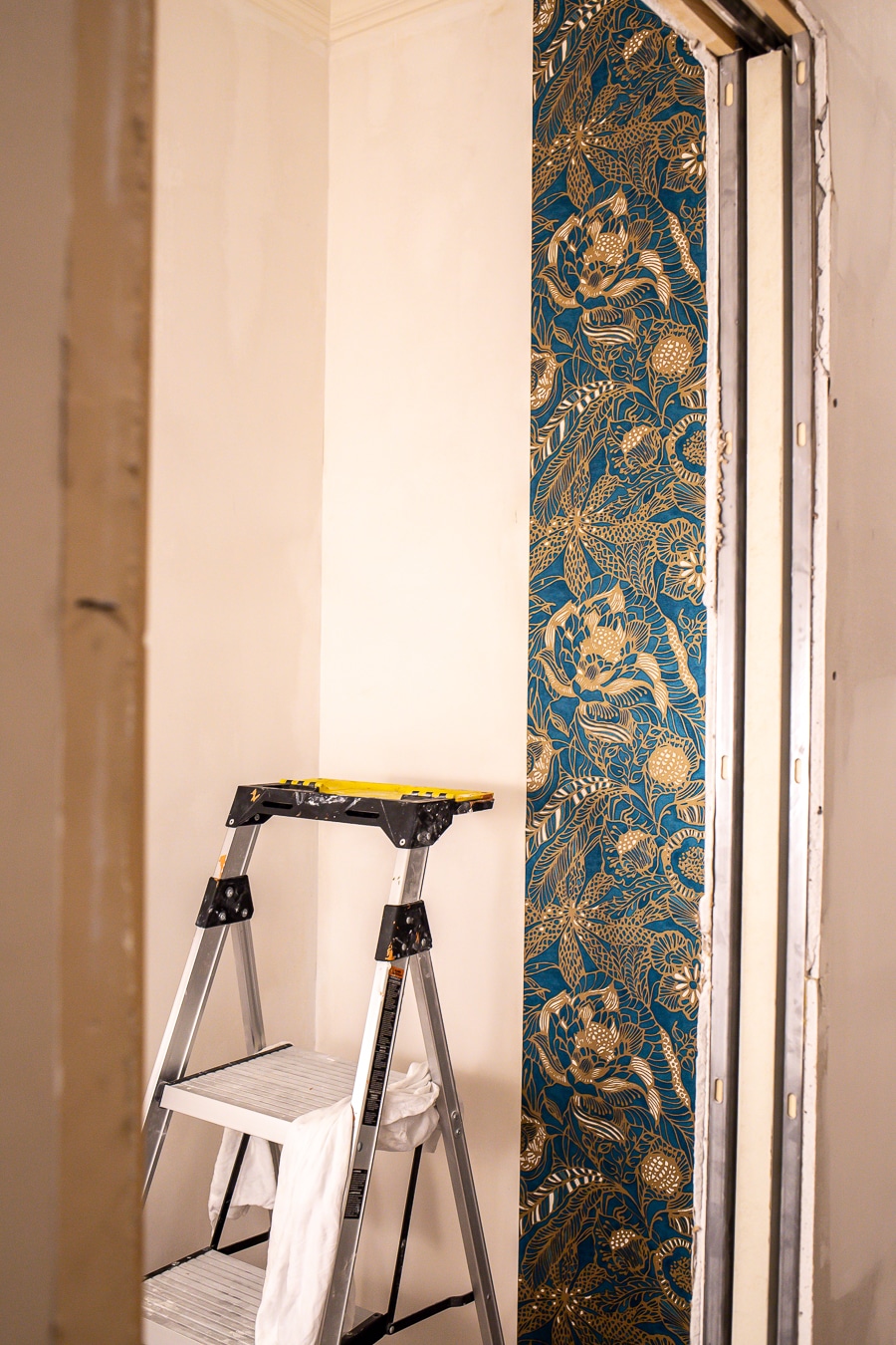 Powder Room Renovation With A Floating Vanity and Statement Wallpaper