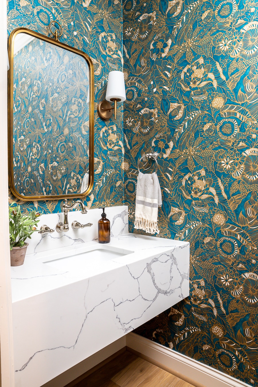 Powder Room Renovation With A Floating Vanity And Statement Wallpaper