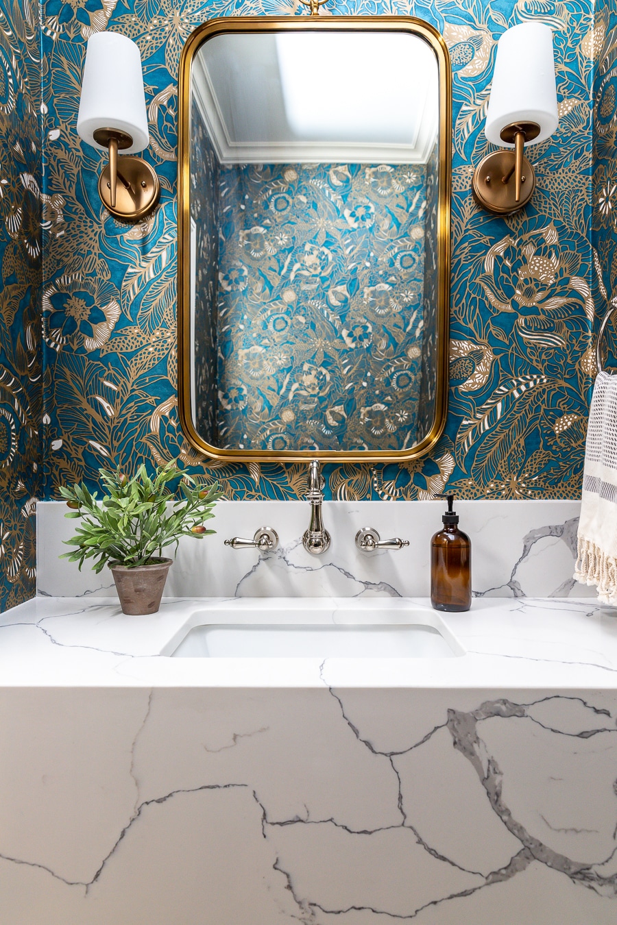 Powder Room Renovation With A Floating Vanity And Statement Wallpaper