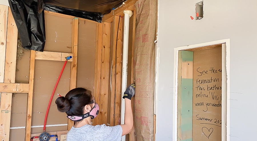 Installing insulation in between studs