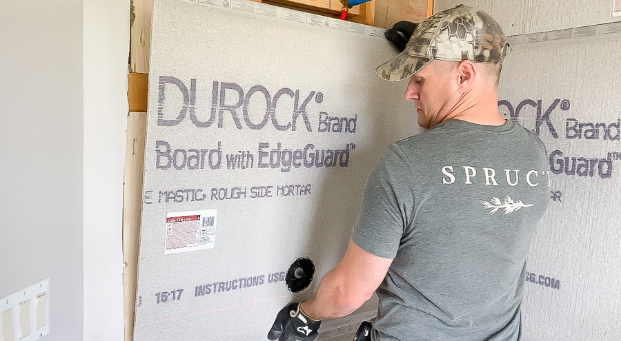 Installing cement board on shower walls