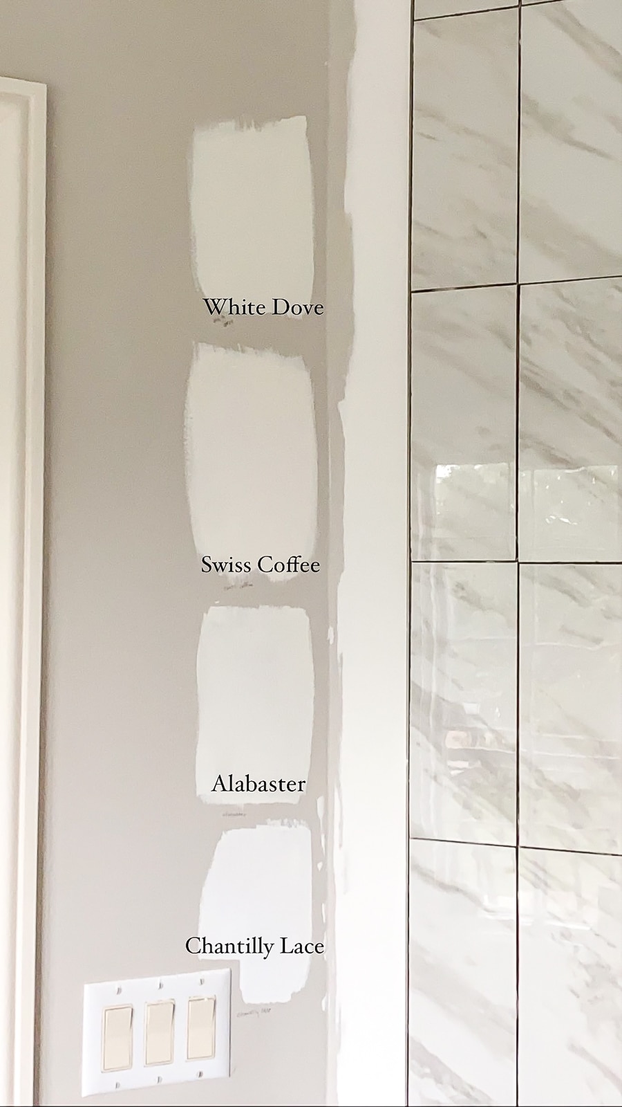 White paint swatches in the bathroom