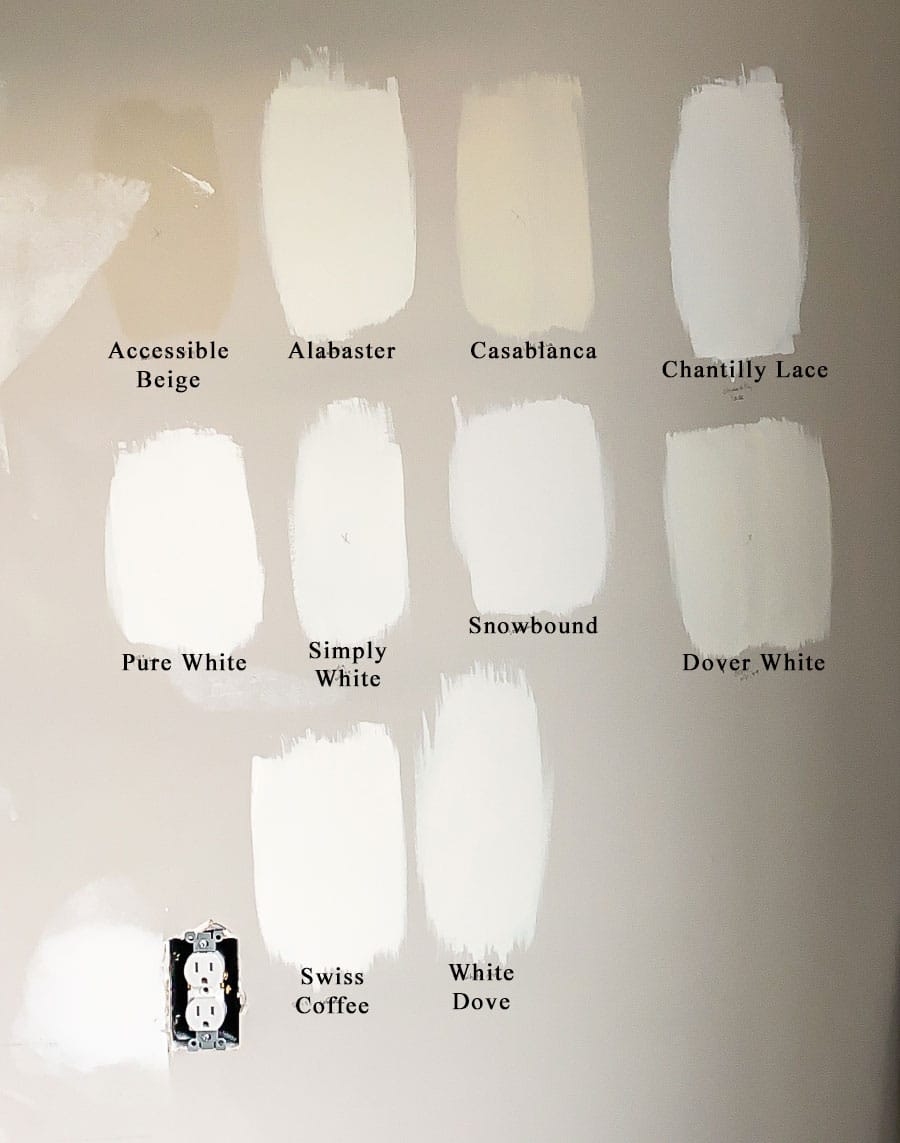 Testing white paint colors in the bathroom