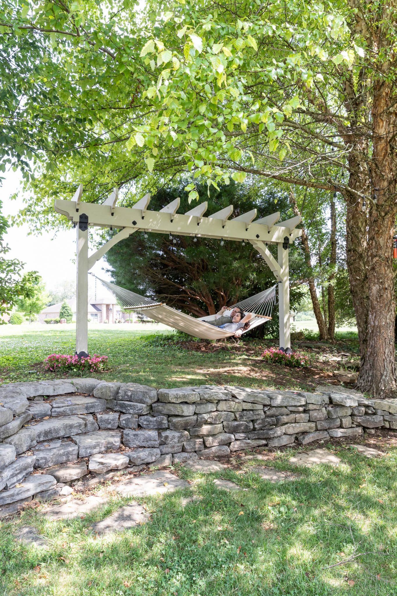 Pergola with best sale hammock swing