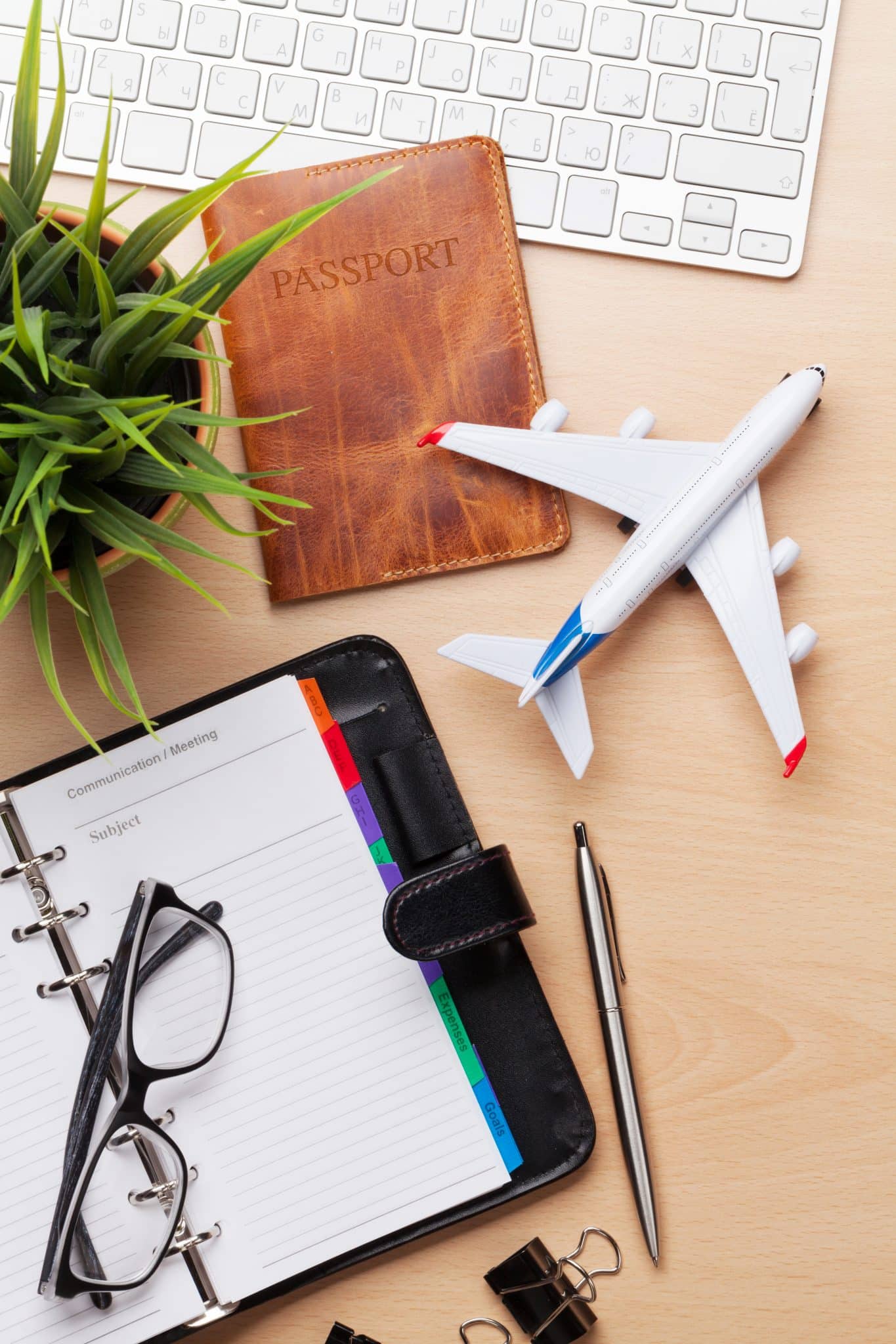 Business trip concept. Accessories on desk table