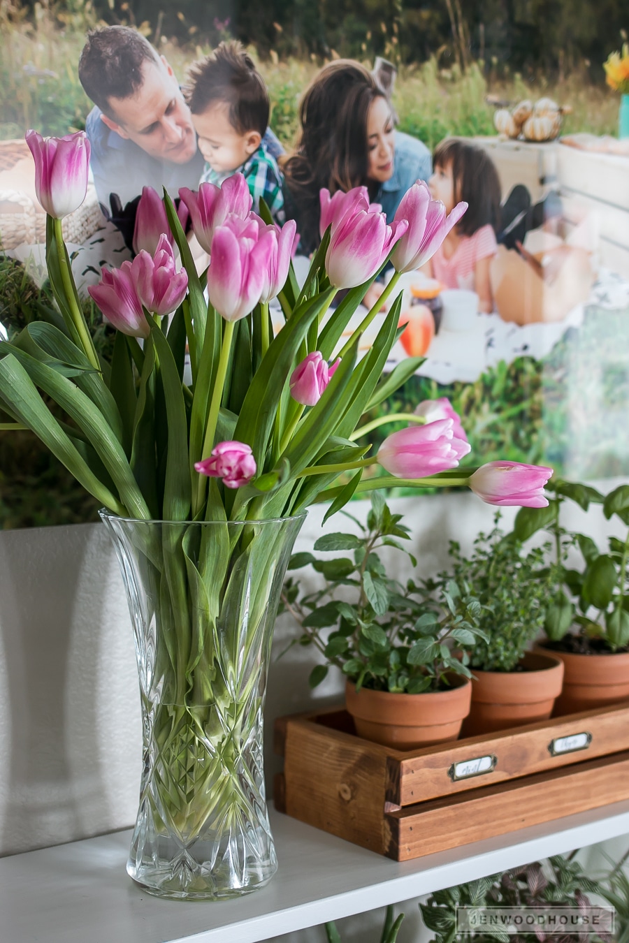 Decorate for Spring by adding a vase of tulips to your shelf