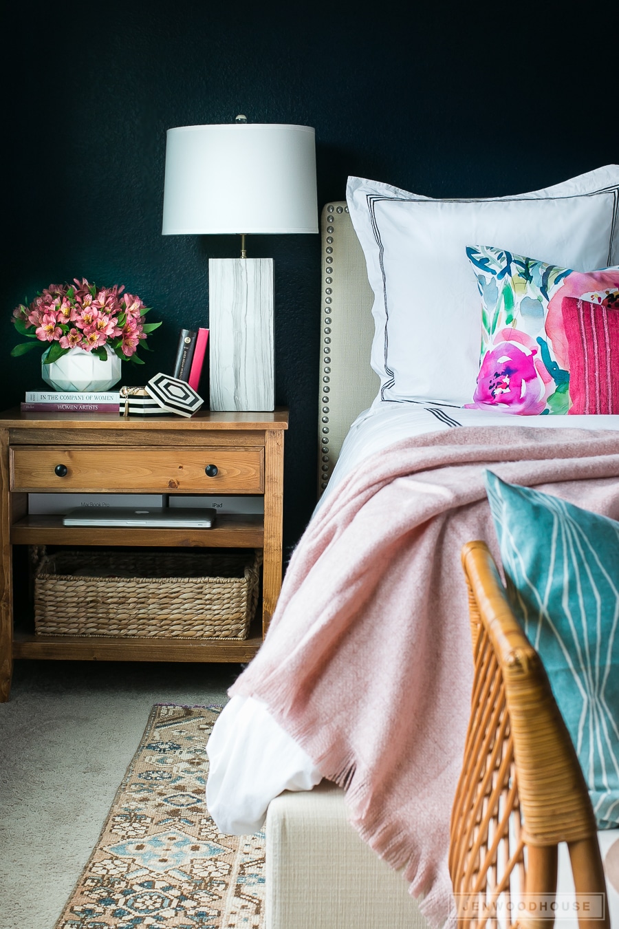 Add simple touches of Spring to your master bedroom by adding floral pillows and fresh flowers