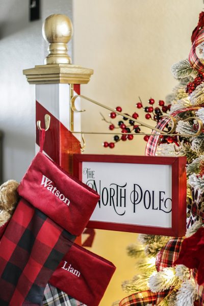No mantel? No problem! Make this DIY Christmas stocking holder and hang your stockings in a fun and festive way! No mantel necessary!