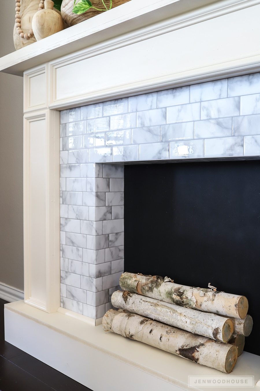 DIY Faux Fireplace Featuring Smart Tiles Adhesive Tiles - no messy grout! No fancy tools!