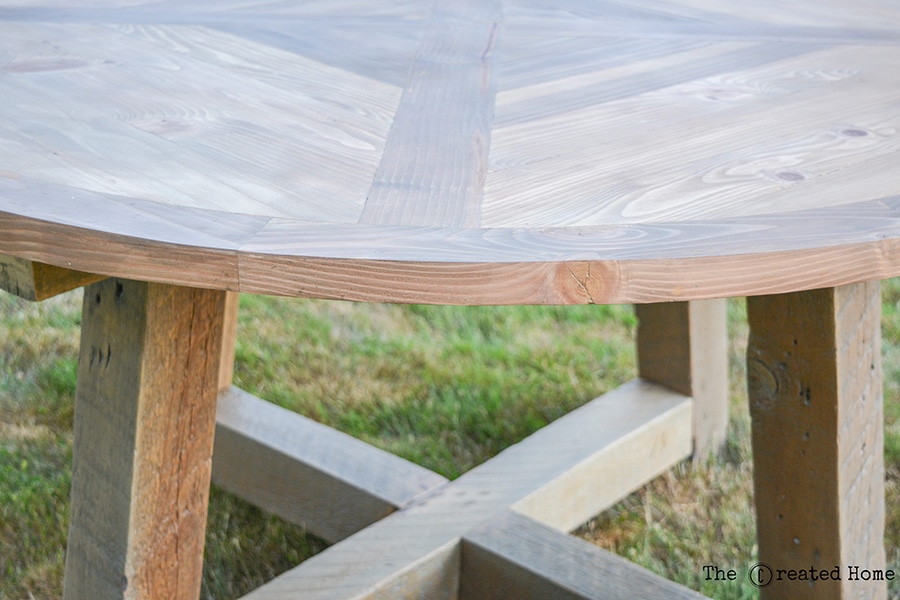 How to build a gorgeous DIY round dining table from reclaimed wood beams. Plans by Jen Woodhouse